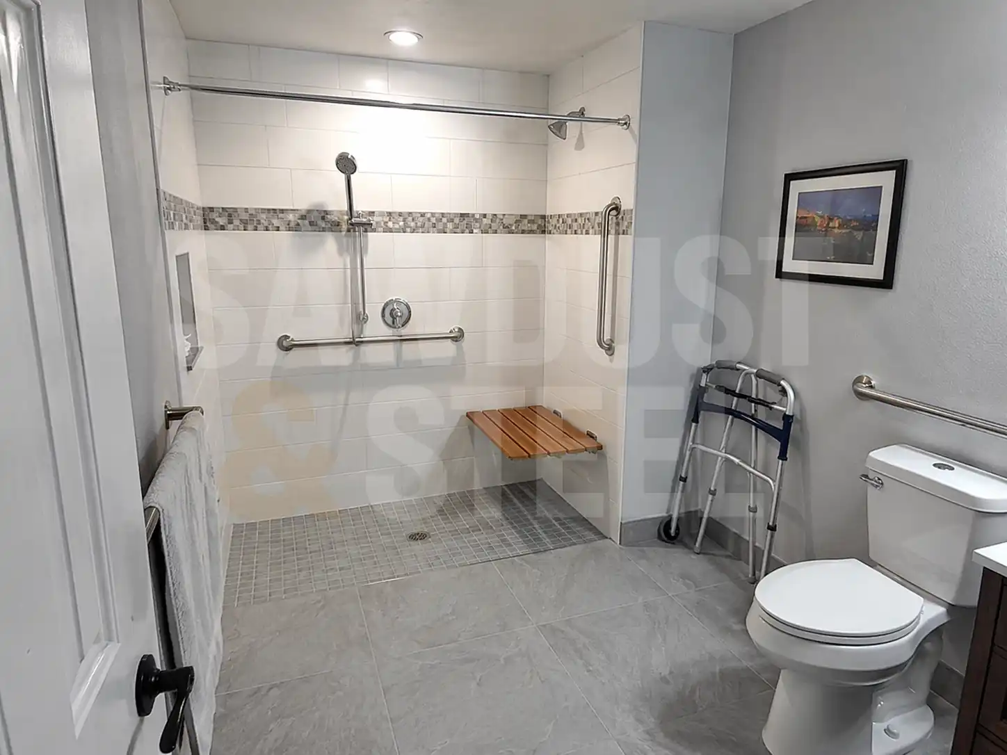 Accessible curbless walk-in shower with grab bars and linear drain