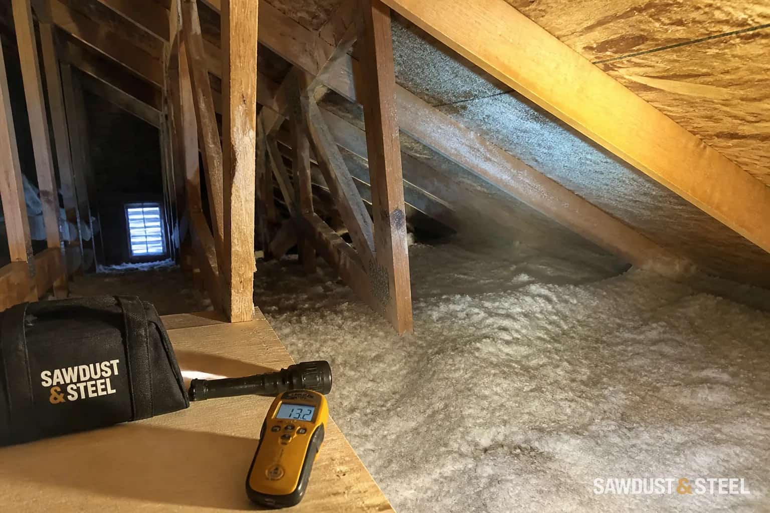 Editorial view of light frost on roof sheathing in an ordinary residential attic