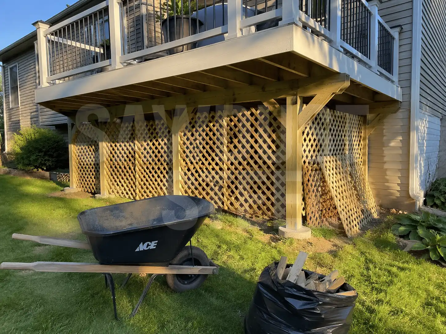 Raised residential deck in the GTA showing code-compliant lattice skirt and framing